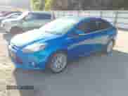 2013 Ford Focus Titanium with VIN 1FADP3J29DL129332, listed as a IAAI auction lot 43120139 with Not provided miles and . Bid and sale history available at DreamBid. Image 2.