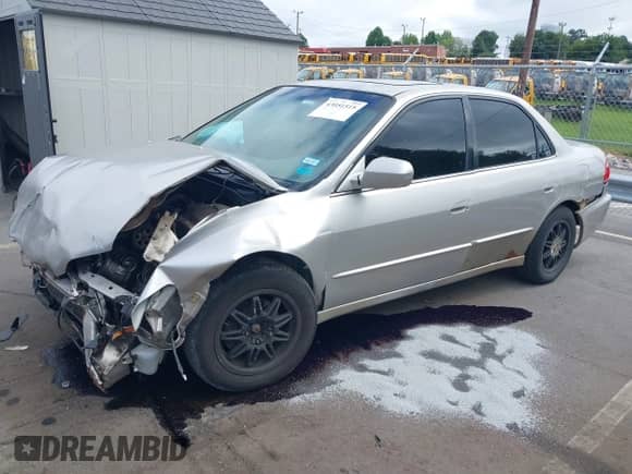 1999 Honda Accord EX with VIN JHMCG5655XC022933, listed as a IAAI auction lot 43051515 with 305,973 mi miles and . Bid and sale history available at DreamBid. Image 2.