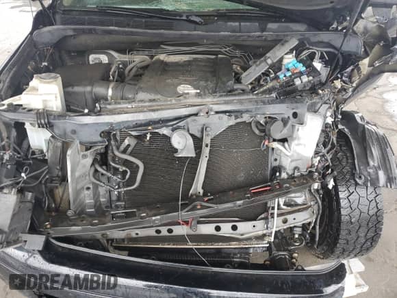 2012 Toyota Tundra Limited z VIN 5TFSY5F16CX118662, wystawiony jako Copart lot #73175064 z przebiegiem Nie podano mil oraz Szkoda całkowita • Salvage title. Historia ofert i sprzedaży dostępna na DreamBid. Obrazek 12.