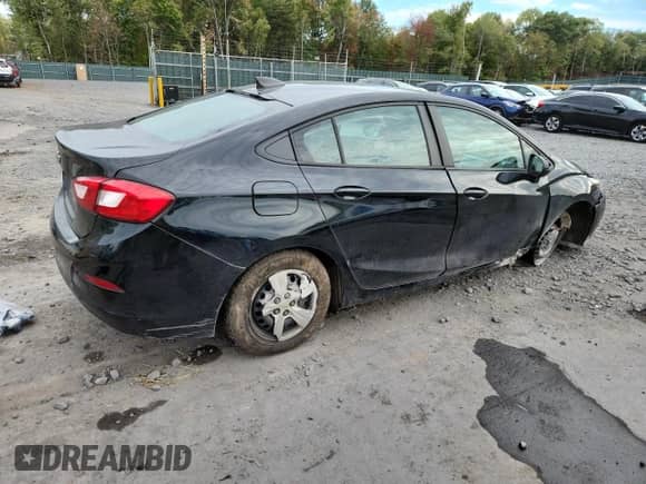 2018 Chevrolet Cruze LS с VIN 1G1BC5SM2J7155597, выставлен на аукционе Copart как лот 82187685 с пробегом Не указан миль и Списание • Salvage title. История ставок и продаж доступна на DreamBid. Изображение 3.