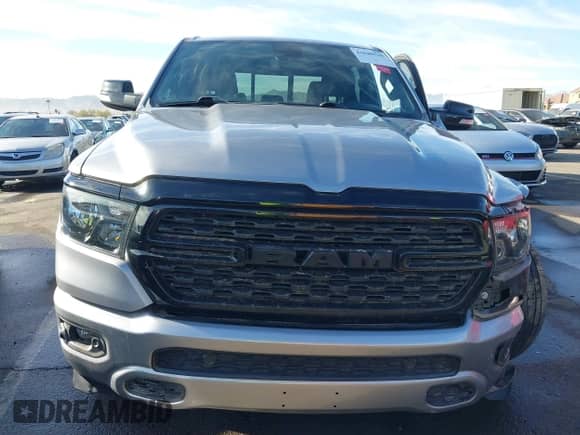 2022 Ram 1500 Big Horn z VIN 1C6RREFT5NN312277, wystawiony jako IAAI lot #41640510 z przebiegiem 36 479 mil mil oraz . Historia ofert i sprzedaży dostępna na DreamBid. Obrazek 12.