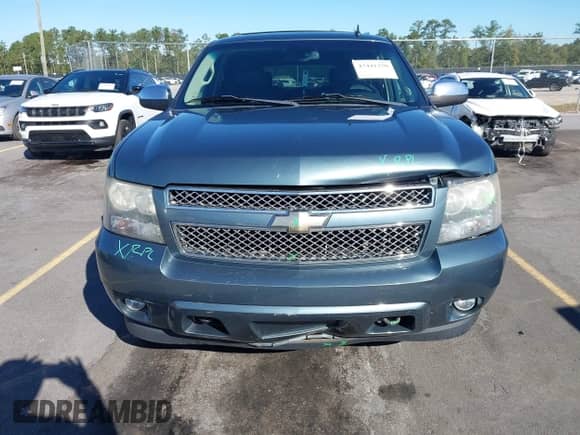 2009 Chevrolet Tahoe LTZ z VIN 1GNFK33279R126021, wystawiony jako IAAI lot #43441250 z przebiegiem 181 053 mil mil oraz . Historia ofert i sprzedaży dostępna na DreamBid. Obrazek 12.