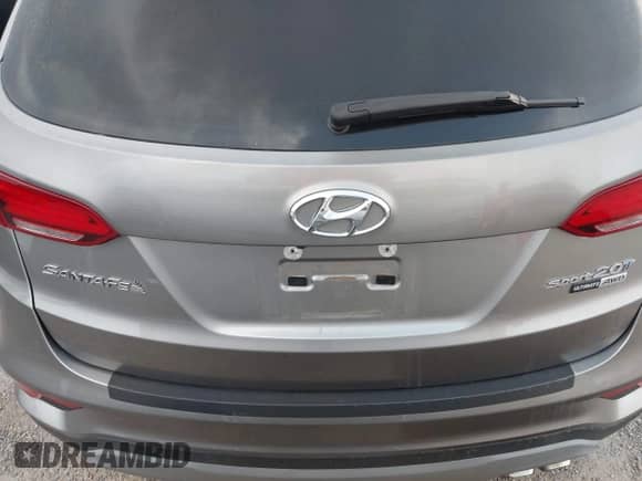 2018 Hyundai Santa Fe Ultimate с VIN 5NMZWDLAXJH100108, выставлен на аукционе IAAI как лот 42126768 с пробегом 68 325 миль миль и . История ставок и продаж доступна на DreamBid. Изображение 16.