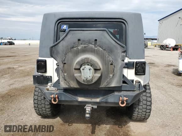 2008 Jeep Wrangler X с VIN 1J4FA24118L627350, выставлен на аукционе Copart как лот 82374345 с пробегом 217 748 миль миль и Списание • Salvage title. История ставок и продаж доступна на DreamBid. Изображение 6.