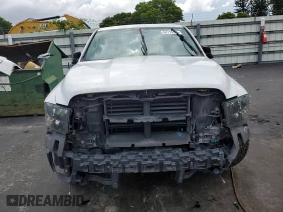 2018 Ram 1500 Tradesman z VIN 1C6RR6FT2JS100454, wystawiony jako Copart lot #64715365 z przebiegiem 145 068 mil mil oraz Szkoda całkowita • Salvage title. Historia ofert i sprzedaży dostępna na DreamBid. Obrazek 5.