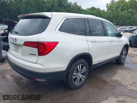 2018 Honda Pilot EX-L z VIN 5FNYF6H52JB057100, wystawiony jako IAAI lot #42775886 z przebiegiem 89 390 mil mil oraz . Historia ofert i sprzedaży dostępna na DreamBid. Obrazek 4.