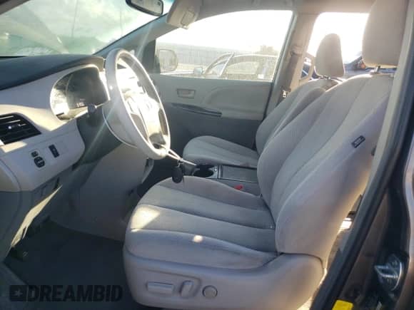 2012 Toyota Sienna LE with VIN 5TDKK3DC5CS231390, listed as a Copart auction lot 85662385 with 125,918 mi miles and Salvage title. Bid and sale history available at DreamBid. Image 7.