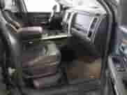 2014 Ram 1500 Laramie z VIN 1C6RR7NM2ES476528, wystawiony jako IAAI lot #42309574 z przebiegiem 150 307 mil mil oraz . Historia ofert i sprzedaży dostępna na DreamBid. Obrazek 5.