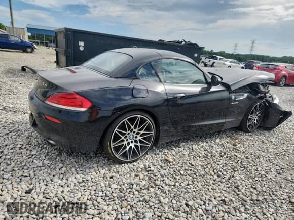 2014 BMW Z4 sDrive35i with VIN WBALM7C57EE386327, listed as a Copart auction lot 63266335 with Not provided miles and Salvage title. Bid and sale history available at DreamBid. Image 3.