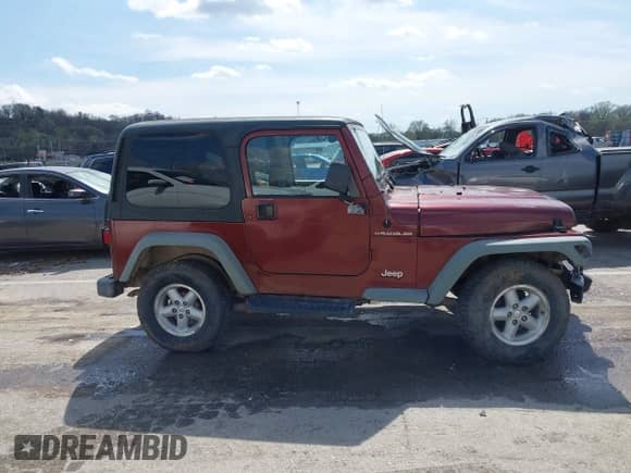 2001 Jeep Wrangler SE with VIN 1J4FA29P21P300094, listed as a IAAI auction lot 41871446 with 125,098 mi miles and . Bid and sale history available at DreamBid. Image 13.