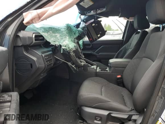 2024 Toyota Tacoma SR with VIN 3TYKD5HN0RT013601, listed as a Copart auction lot 69126575 with 4,033 mi miles and Salvage title. Bid and sale history available at DreamBid. Image 7.