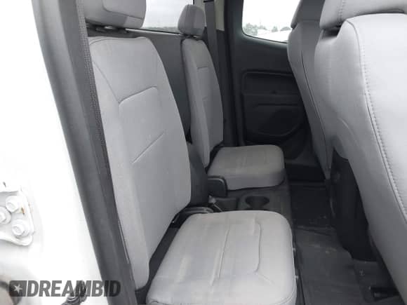 2022 Chevrolet Colorado 2WD Work Truck with VIN 1GCHSBENXN1323079, listed as a IAAI auction lot 41959638 with 19,705 mi miles and . Bid and sale history available at DreamBid. Image 8.