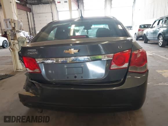 2013 Chevrolet Cruze 2LT z VIN 1G1PE5SB1D7109990, wystawiony jako IAAI lot #42479341 z przebiegiem 109 765 mil mil oraz . Historia ofert i sprzedaży dostępna na DreamBid. Obrazek 16.