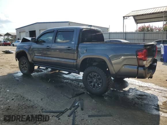 2023 Toyota Tacoma SR с VIN 3TMCZ5AN0PM590248, выставлен на аукционе Copart как лот 71676145 с пробегом 16 675 миль миль и Списание • Salvage title. История ставок и продаж доступна на DreamBid. Изображение 2.