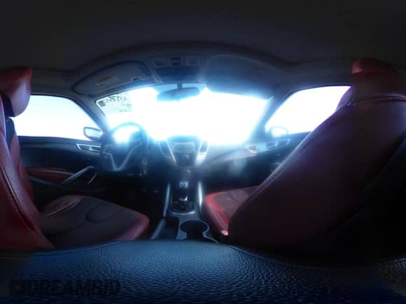 2012 Hyundai Veloster w/Black Int z VIN KMHTC6AD0CU023702, wystawiony jako IAAI lot #43149525 z przebiegiem 166 308 mil mil oraz . Historia ofert i sprzedaży dostępna na DreamBid. Obrazek 19.