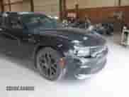 2018 Dodge Charger R/T z VIN 2C3CDXCT8JH331636, wystawiony jako IAAI lot #43083523 z przebiegiem 136 301 mil mil oraz . Historia ofert i sprzedaży dostępna na DreamBid. Obrazek 6.