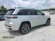 2023 Jeep Grand Cherokee Overland с VIN 1C4RJGDG9P8906051, выставлен на аукционе Copart как лот 63326785 с пробегом 37 835 миль миль и Списание • Salvage title. История ставок и продаж доступна на DreamBid. Изображение 3.