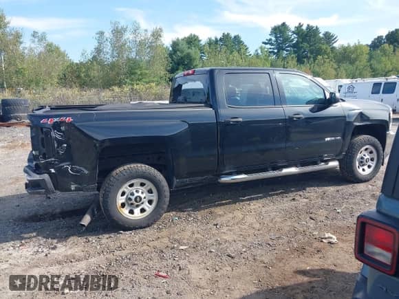 2015 Chevrolet Silverado 2500HD Work Truck z VIN 1GC1KUEG0FF649329, wystawiony jako IAAI lot #43208951 z przebiegiem 112 025 mil mil oraz . Historia ofert i sprzedaży dostępna na DreamBid. Obrazek 14.