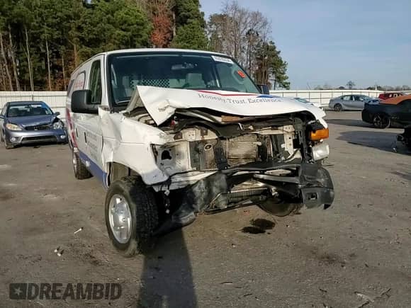 2012 Ford Econoline Cargo Commercial with VIN 1FTNE1EWXCDA96730, listed as a Copart auction lot 85035534 with 141,115 mi miles and Salvage title. Bid and sale history available at DreamBid. Image 11.