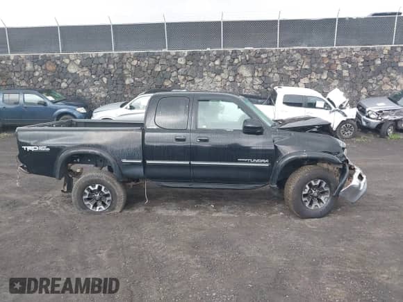2001 Toyota Tundra Limited z VIN 5TBBT48131S129314, wystawiony jako IAAI lot #42419214 z przebiegiem 169 024 mil mil oraz . Historia ofert i sprzedaży dostępna na DreamBid. Obrazek 13.