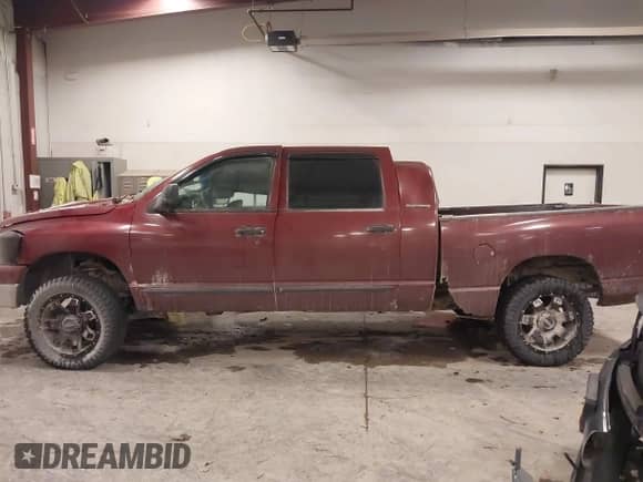2007 Dodge 2500 Laramie with VIN 3D7KS29C57G731966, listed as a IAAI auction lot 41373936 with 239,931 mi miles and . Bid and sale history available at DreamBid. Image 14.