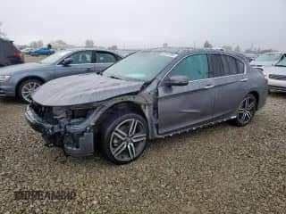 2016 Honda Accord Touring with VIN 1HGCR3F97GA030452, listed as a Copart auction lot 82491995 with 30,807 mi miles and Salvage title. Bid and sale history available at DreamBid. Image 1.