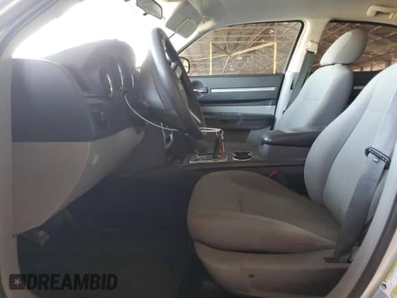 2009 Dodge Charger SE with VIN 2B3KA43D39H505990, listed as a Copart auction lot 71044214 with 223,573 mi miles and Salvage title. Bid and sale history available at DreamBid. Image 7.