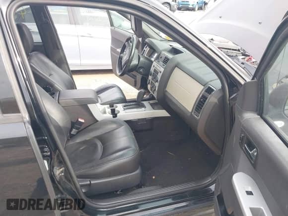 2008 Mercury Mariner with VIN 4M2CU91108KJ51427, listed as a IAAI auction lot 43339990 with 227,044 mi miles and . Bid and sale history available at DreamBid. Image 5.