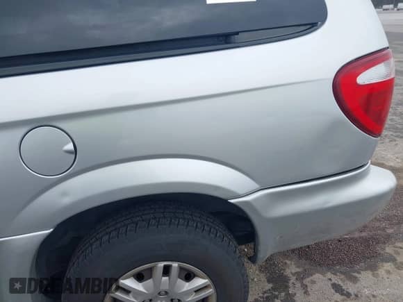 2005 Dodge Grand Caravan with VIN 2D8GP24R65R343635, listed as a IAAI auction lot 41932889 with 143,620 mi miles and . Bid and sale history available at DreamBid. Image 6.