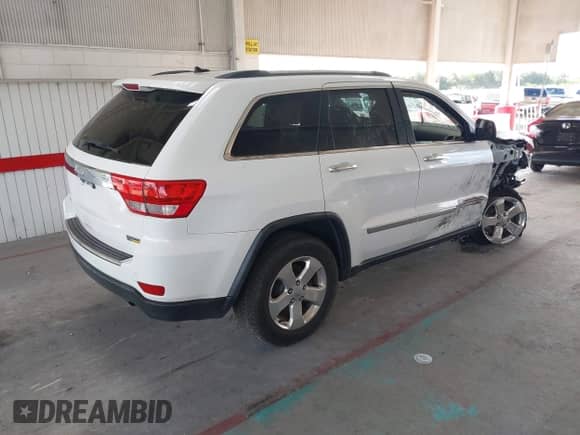 2013 Jeep Grand Cherokee Limited z VIN 1C4RJEBG6DC595730, wystawiony jako IAAI lot #43418036 z przebiegiem 163 431 mil mil oraz . Historia ofert i sprzedaży dostępna na DreamBid. Obrazek 4.