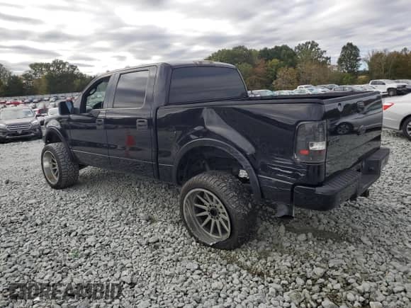 2006 Ford F-150 XLT with VIN 1FTPW14V36FA88511, listed as a Copart auction lot 69152395 with 216,622 mi miles and Salvage title. Bid and sale history available at DreamBid. Image 2.