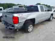 2017 Chevrolet Silverado 1500 LT with VIN 1GCVKREH2HZ253413, listed as a IAAI auction lot 42423819 with 103,934 mi miles and . Bid and sale history available at DreamBid. Image 4.