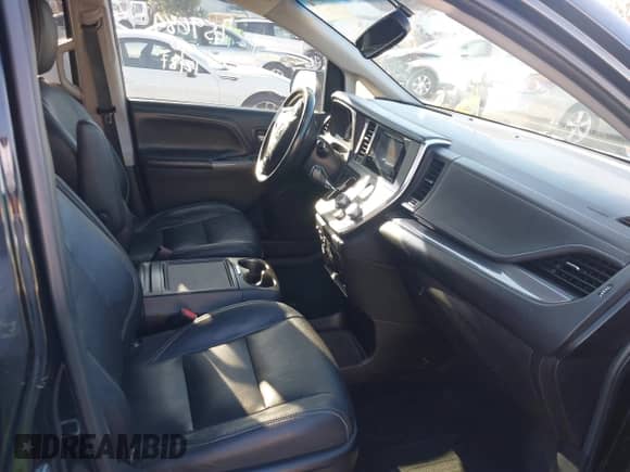 2015 Toyota Sienna SE with VIN 5TDXK3DC4FS583841, listed as a IAAI auction lot 41223820 with 190,117 mi miles and . Bid and sale history available at DreamBid. Image 5.