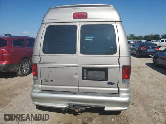 2002 Ford Econoline Cargo Recreational with VIN 1FDRE14L22HB70265, listed as a Copart auction lot 69053235 with 245,320 mi miles and Salvage title. Bid and sale history available at DreamBid. Image 6.
