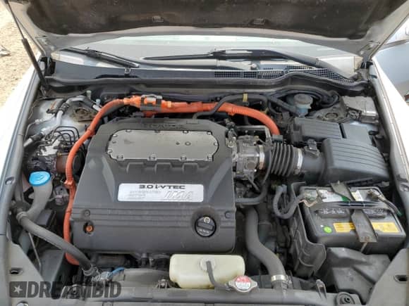 2006 Honda Accord with NAVI z VIN JHMCN36576C003471, wystawiony jako Copart lot #59330565 z przebiegiem 92 999 mil mil oraz Szkoda całkowita • Salvage title. Historia ofert i sprzedaży dostępna na DreamBid. Obrazek 11.