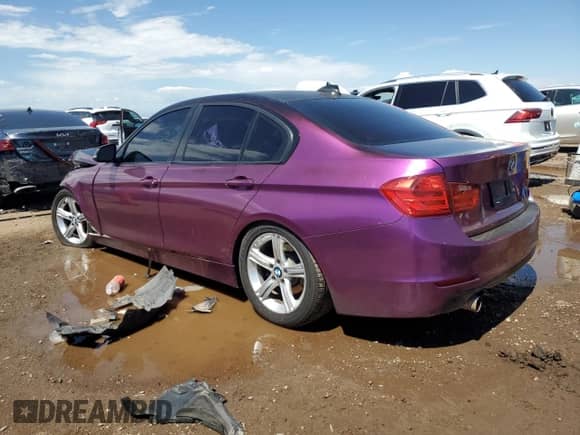 2013 BMW 3 Series 328i xDrive with VIN WBA3B3C50DF542473, listed as a Copart auction lot 69501165 with 136,590 mi miles and Salvage title. Bid and sale history available at DreamBid. Image 2.