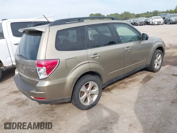 2009 Subaru Forester XT Limited with VIN JF2SH66649H709496, listed as a IAAI auction lot 43405833 with 148,497 mi miles and . Bid and sale history available at DreamBid. Image 4.