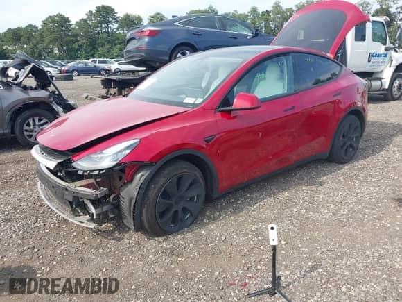 2022 Tesla Model Y Long Range z VIN 7SAYGAEE3NF484623, wystawiony jako IAAI lot #42982060 z przebiegiem 29 313 mil mil oraz . Historia ofert i sprzedaży dostępna na DreamBid. Obrazek 2.