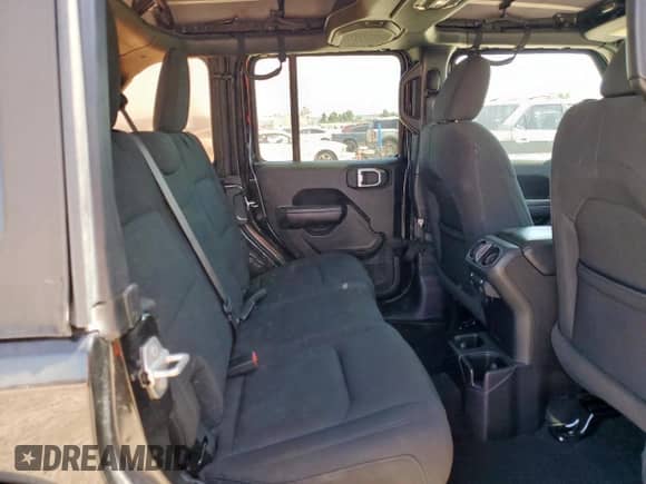 2023 Jeep Wrangler Sport S with VIN 1C4HJXDG7PW526195, listed as a Copart auction lot 66521735 with 54,082 mi miles and Salvage title. Bid and sale history available at DreamBid. Image 11.