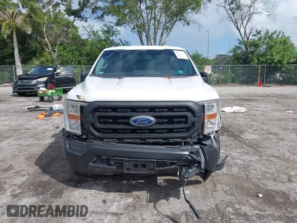 2021 Ford F-150 XL с VIN 1FTEW1CB1MKE77537, выставлен на аукционе IAAI как лот 43409825 с пробегом 106 015 миль миль и . История ставок и продаж доступна на DreamBid. Изображение 19.
