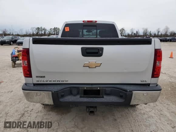 2010 Chevrolet Silverado 1500 LTZ with VIN 1GCSCTE06AZ202767, listed as a Copart auction lot 46430905 with 209,519 mi miles and Salvage title. Bid and sale history available at DreamBid. Image 6.