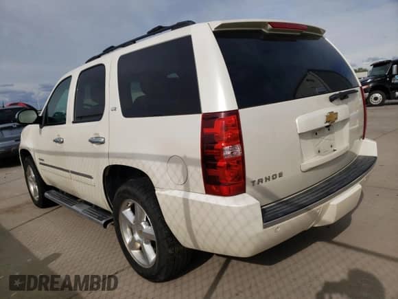 2012 Chevrolet Tahoe LTZ z VIN 1GNSCCE04CR213048, wystawiony jako Copart lot #51284685 z przebiegiem 192 733 mil mil oraz Czysty tytuł • Clean title. Historia ofert i sprzedaży dostępna na DreamBid. Obrazek 2.