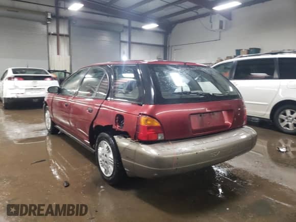 1997 Saturn SW with VIN 1G8ZH8283VZ404571, listed as a Copart auction lot 47432665 with 100,707 mi miles and Salvage title. Bid and sale history available at DreamBid. Image 2.