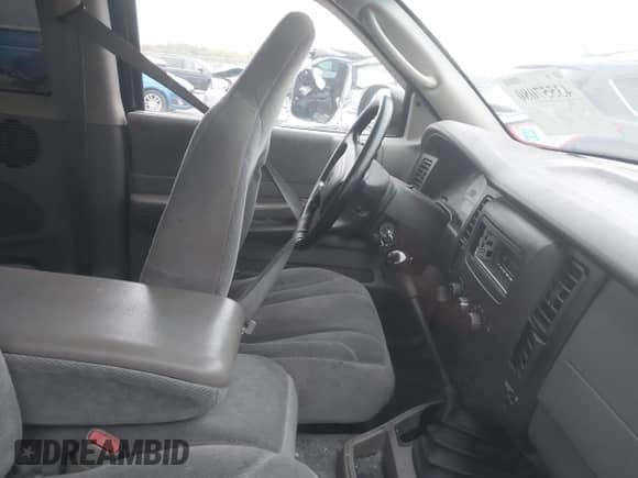 2001 Dodge Dakota Sport z VIN 1B7GG22N81S212519, wystawiony jako IAAI lot #43557080 z przebiegiem 150 028 mil mil oraz . Historia ofert i sprzedaży dostępna na DreamBid. Obrazek 5.