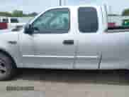 2004 Ford F-150 XL z VIN 2FTRX17294CA54959, wystawiony jako IAAI lot #42871727 z przebiegiem Nie podano mil oraz . Historia ofert i sprzedaży dostępna na DreamBid. Obrazek 14.