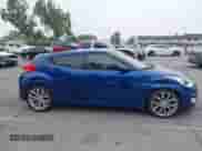 2015 Hyundai Veloster z VIN KMHTC6AD0FU243328, wystawiony jako IAAI lot #42439313 z przebiegiem 96 997 mil mil oraz . Historia ofert i sprzedaży dostępna na DreamBid. Obrazek 13.