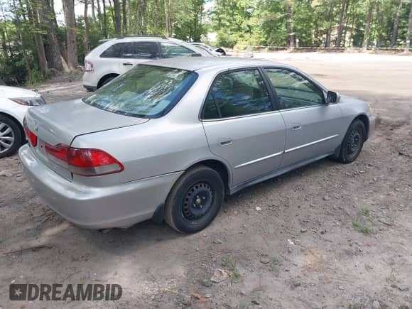 2002 Honda Accord LX with VIN 1HGCG56492A130101, listed as a IAAI auction lot 42643424 with 249,349 mi miles and . Bid and sale history available at DreamBid. Image 4.