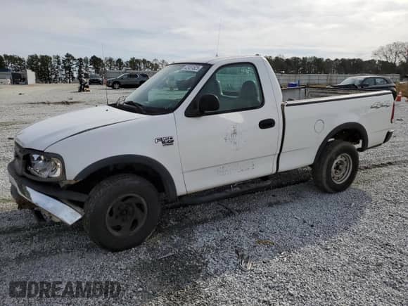 2003 Ford F-150 XL with VIN 1FTRF18W53NB45997, listed as a Copart auction lot 42451525 with 149,166 mi miles and Salvage title. Bid and sale history available at DreamBid. Image 1.