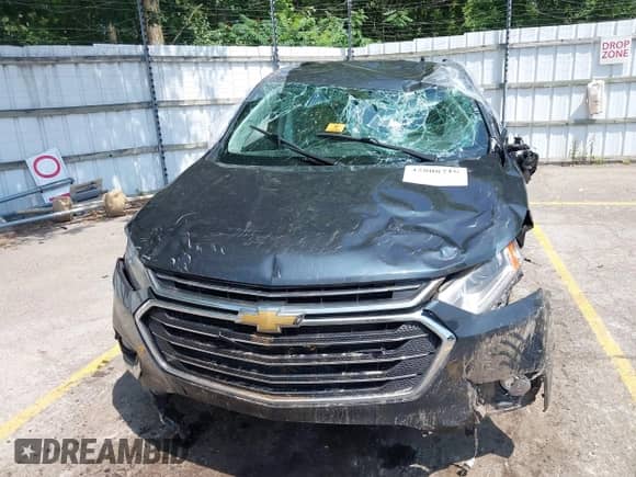 2019 Chevrolet Traverse LT Cloth z VIN 1GNEVGKW2KJ141139, wystawiony jako IAAI lot #42808716 z przebiegiem Nie podano mil oraz . Historia ofert i sprzedaży dostępna na DreamBid. Obrazek 12.