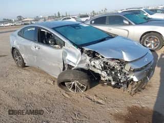 2023 Toyota Prius LE with VIN JTDACAAUXP3003094, listed as a IAAI auction lot 42944738 with 26,066 mi miles and . Bid and sale history available at DreamBid. Image 1.